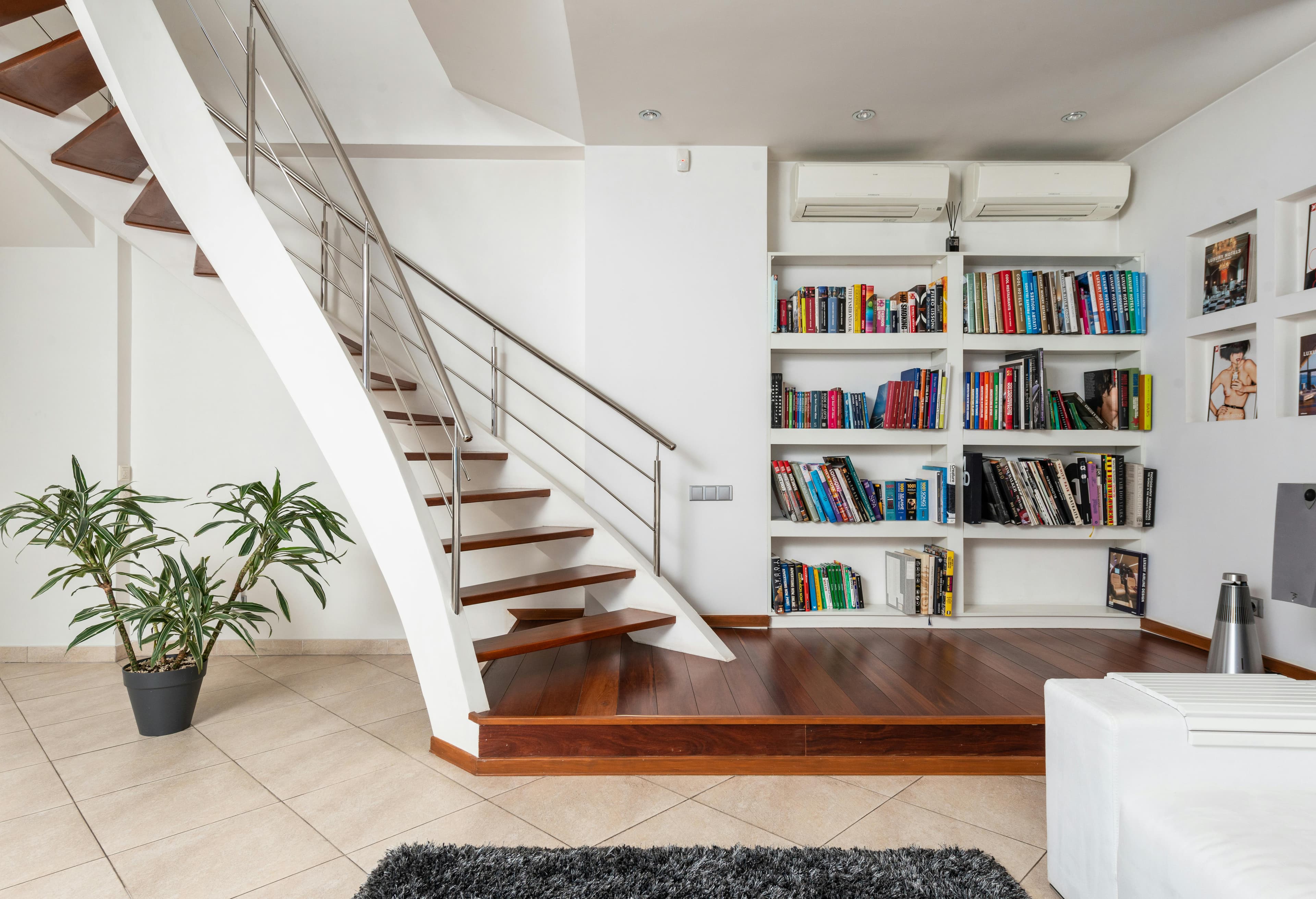 Books and Modern Stairs Living Room